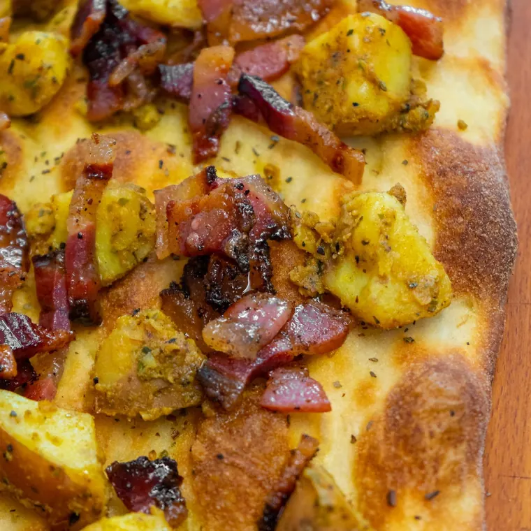 Trancio con patate e salsiccia